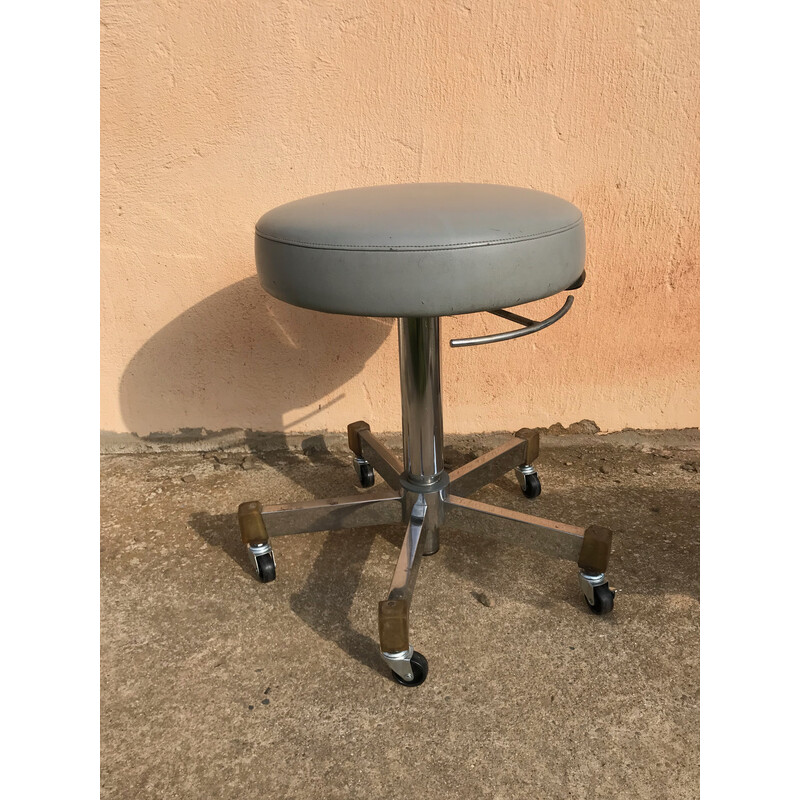 Tabouret ajustable vintage sur roulettes