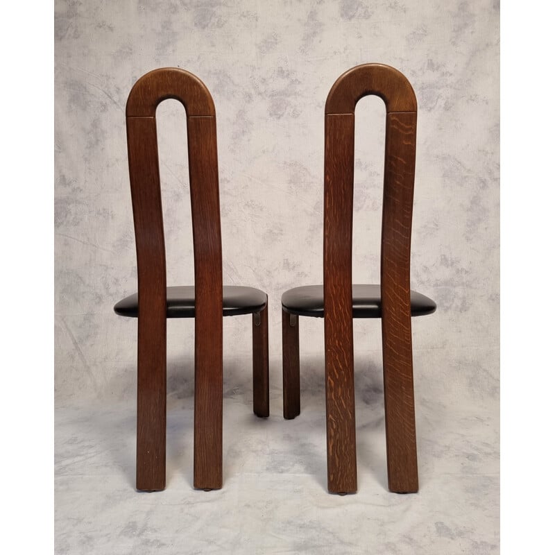 Pair of vintage chairs in solid oak and black faux leather by Bruno Rey for Stuhl Aus Stein Am Rhein, Switzerland