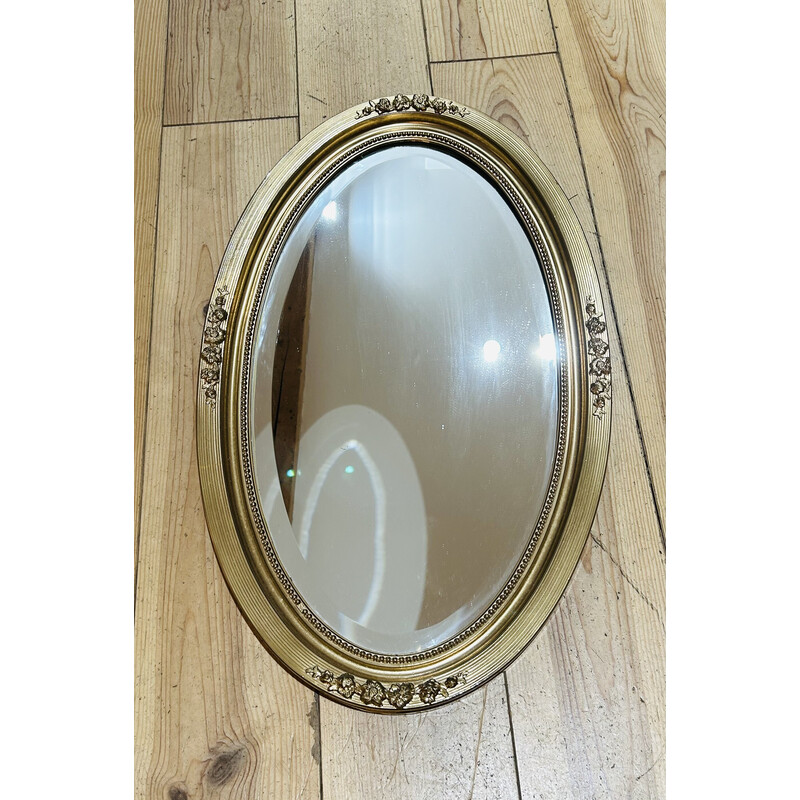 Vintage oval mirror in gilded wood frame
