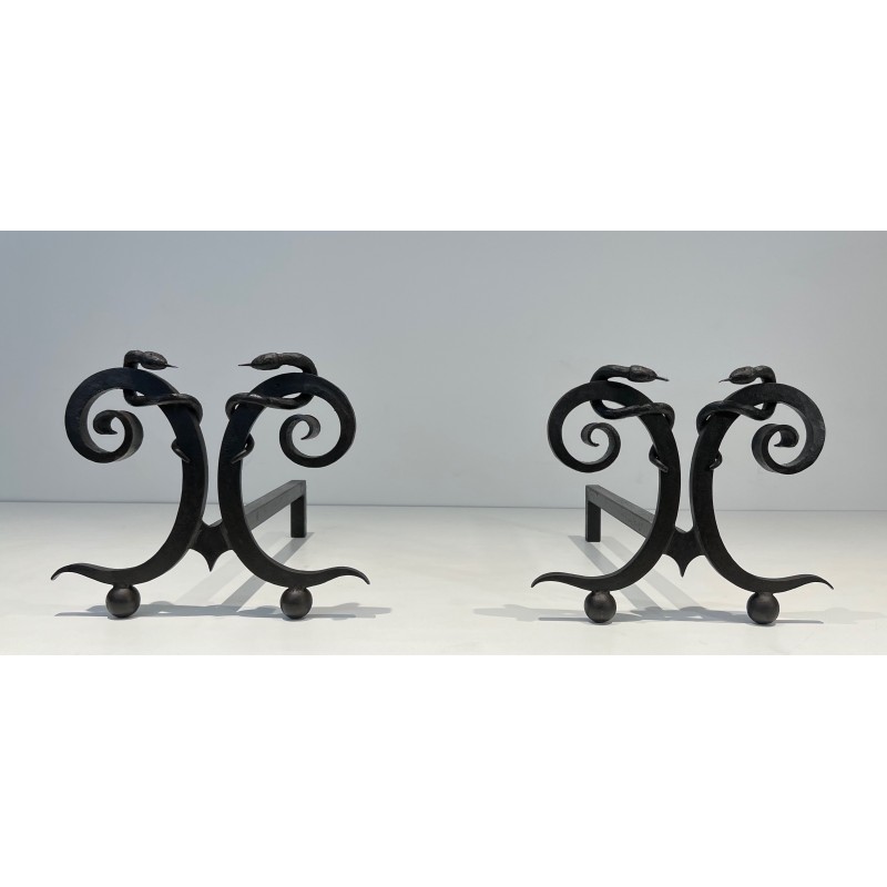 Pair of vintage "aux Serpents" wrought iron andirons, France 1950