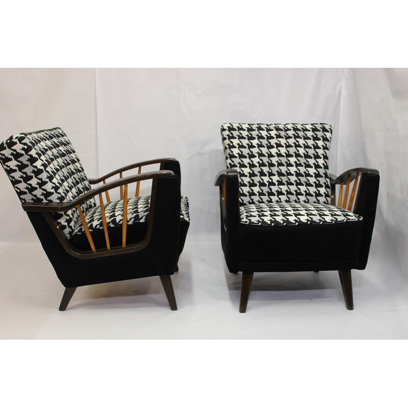 Pair of armchairs with armrests shelves - 1950s