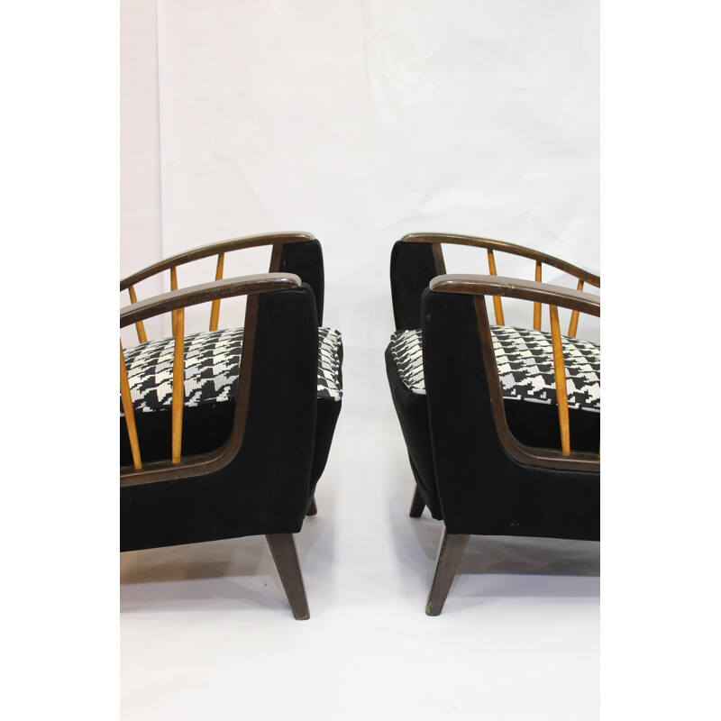 Pair of armchairs with armrests shelves - 1950s