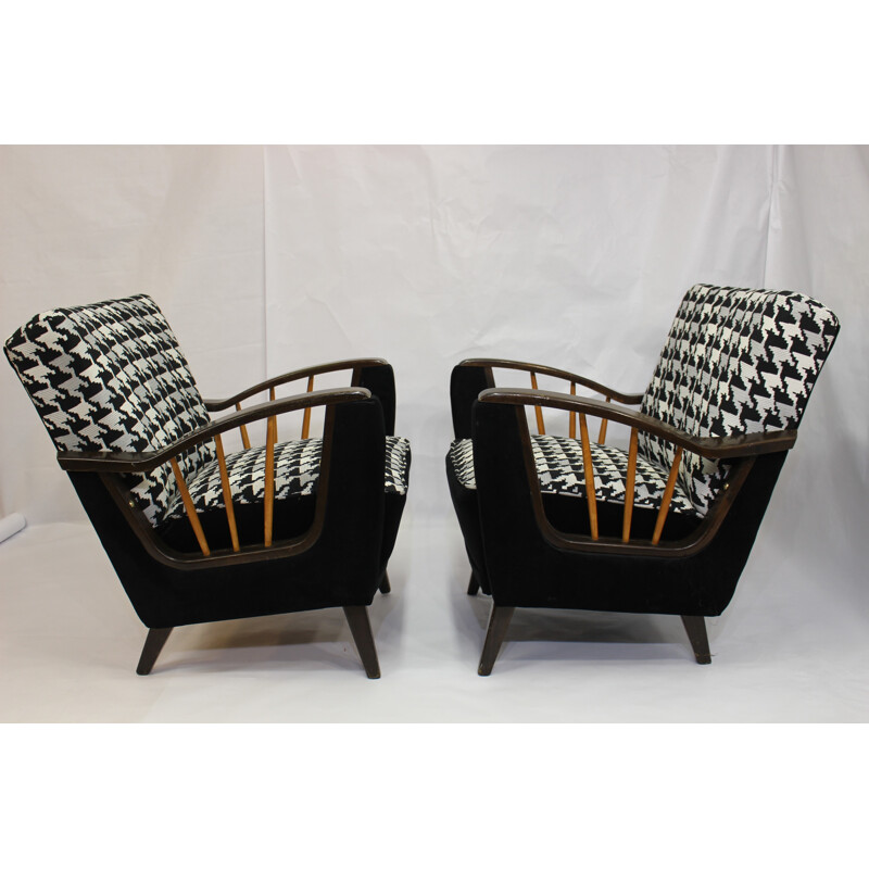 Pair of armchairs with armrests shelves - 1950s