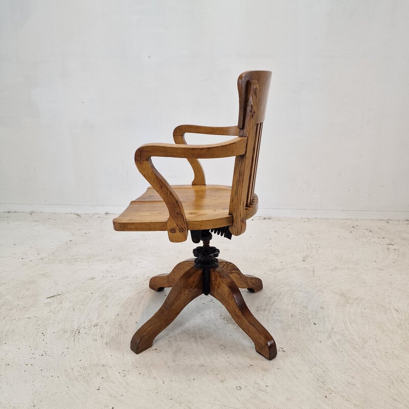 Vintage industrial oak swivel chair, England 1900