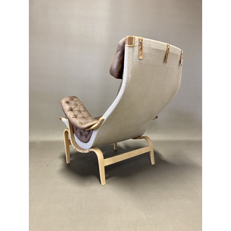 Vintage "Pernilla" armchair in leather and  beech by Bruno Mathsson for Dux, 1960