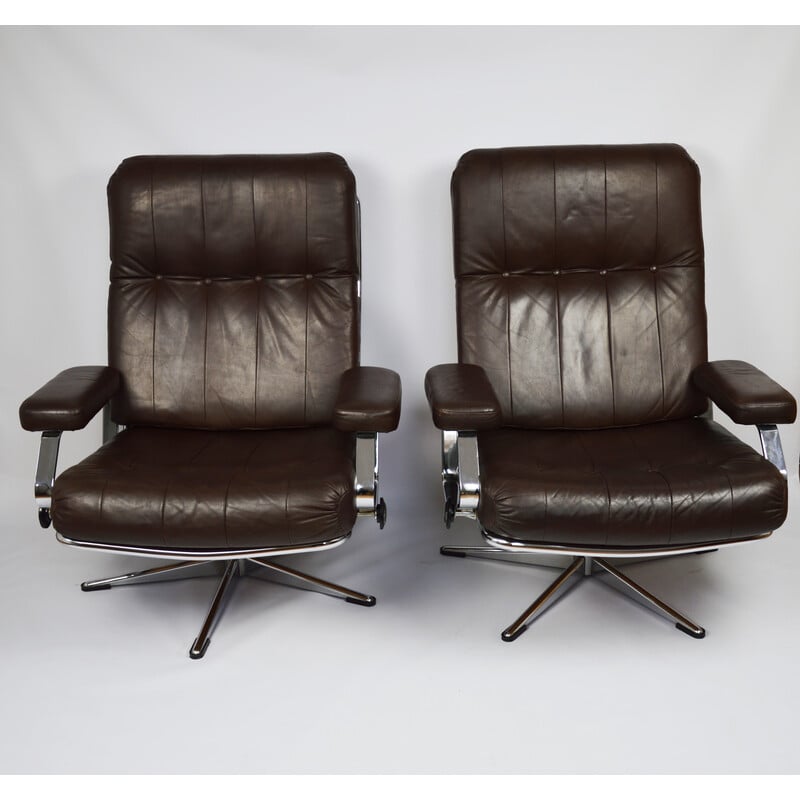 Pair of vintage armchairs in metal and brown leather, 1970