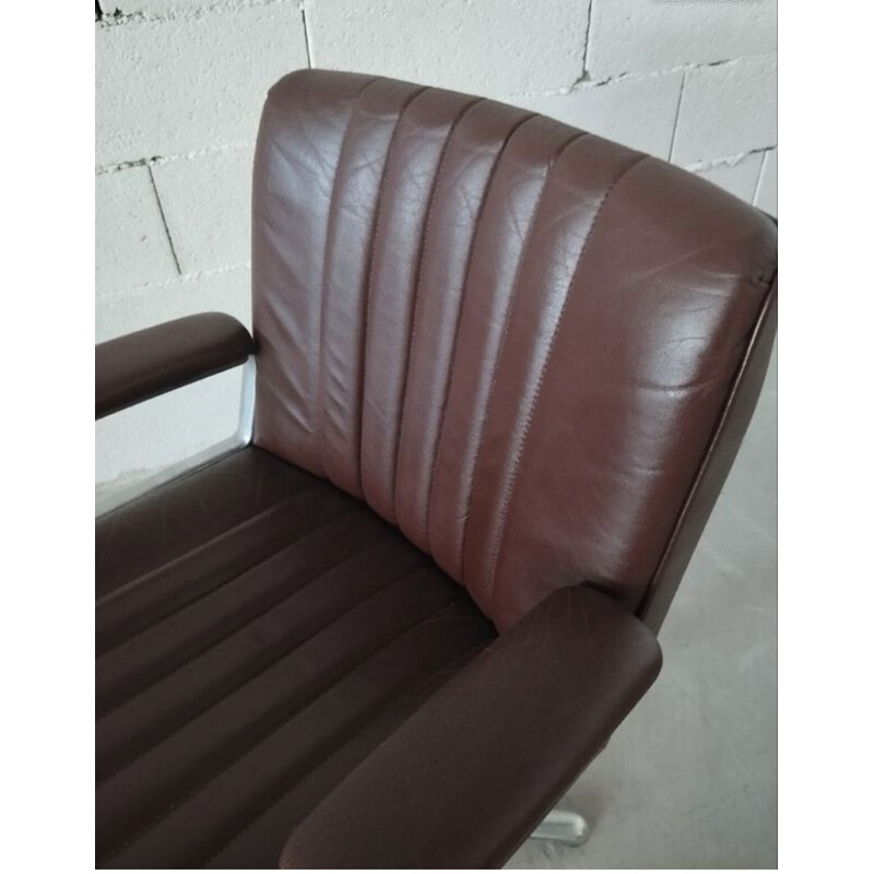 Vintage leather armchair by Osvado Borsani