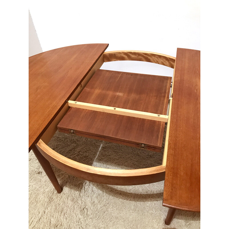 Table de salle à manger ronde extensible danoise en teck produite par Dyrlund - 1960