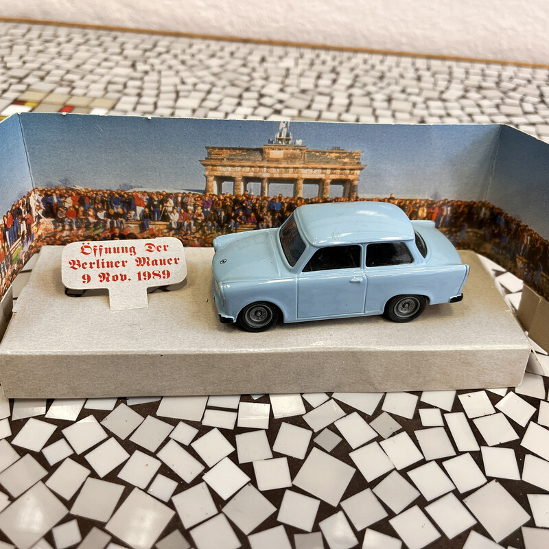 Vintage miniature car "Trabant" made of metal with plastic elements
