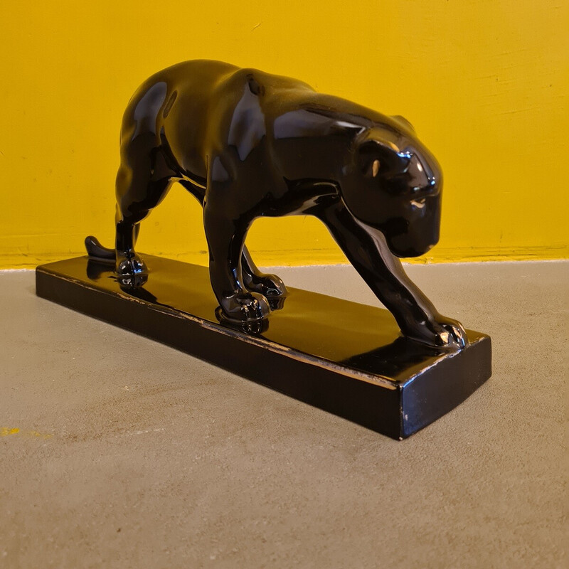Vintage Art Deco panther statue in black and gold lacquered ceramic by Jean pour Massin, France 1930