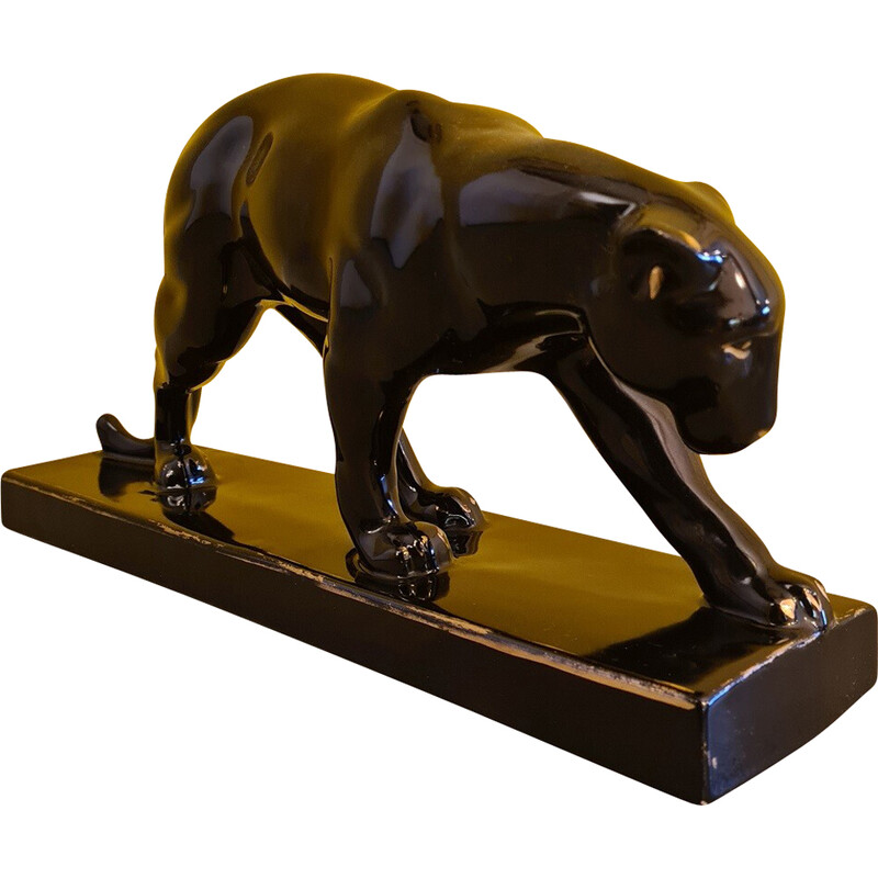 Vintage Art Deco panther statue in black and gold lacquered ceramic by Jean pour Massin, France 1930