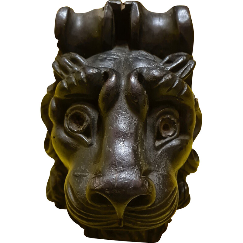 Scultura vintage in legno nero lucido raffigurante una testa di leone