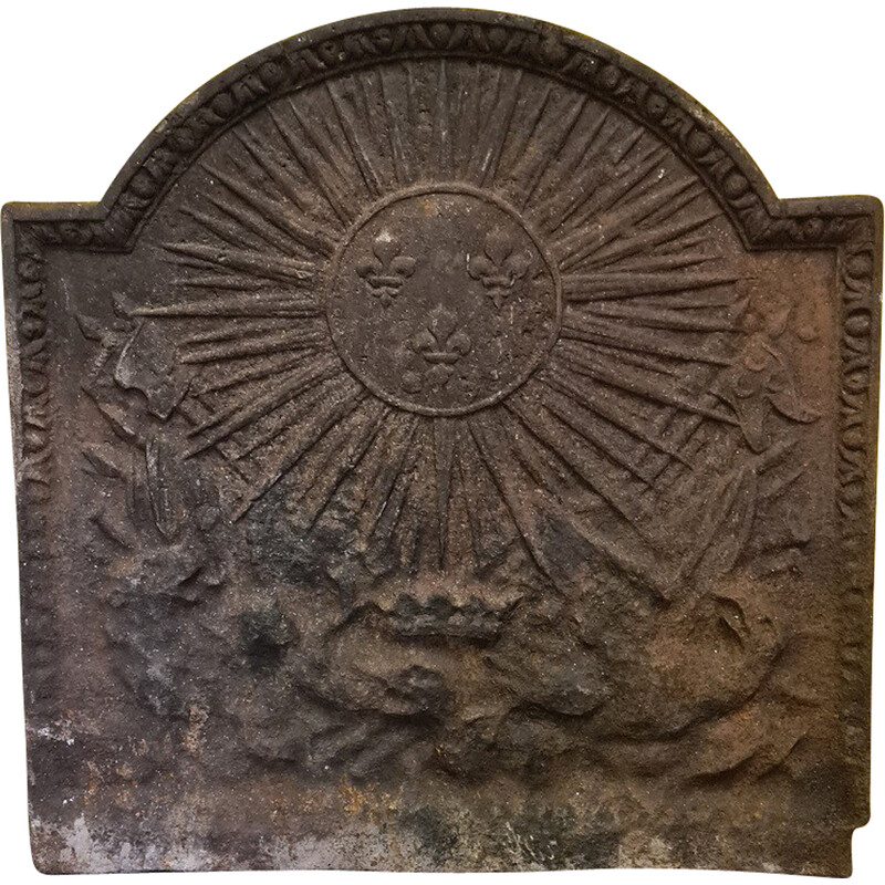 Vintage cast iron fireback with the family arms of the Bourbon family, 1700