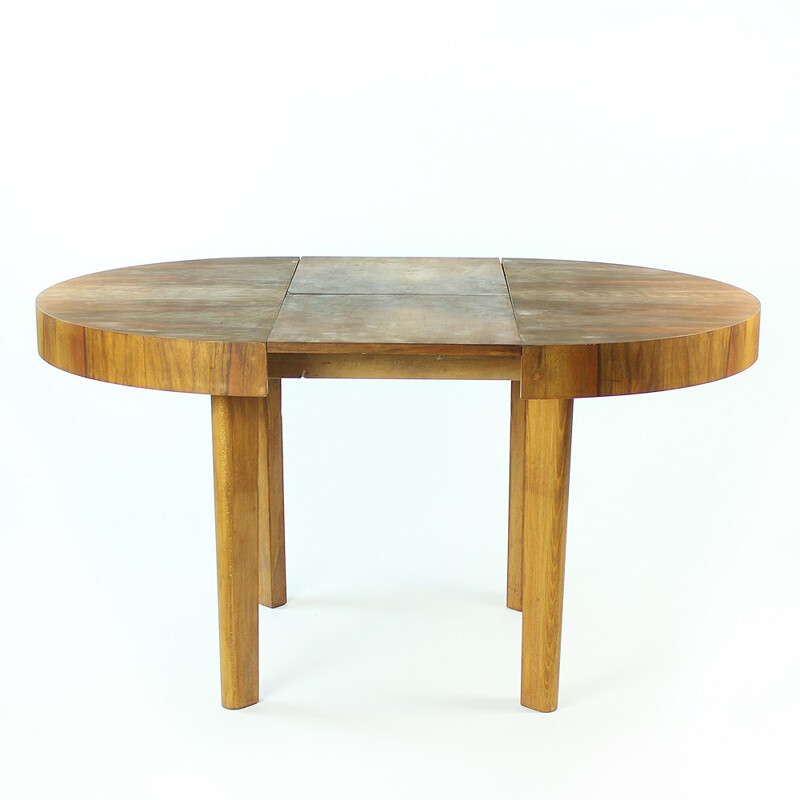 Round dining table in walnut by Jitona - 1960s