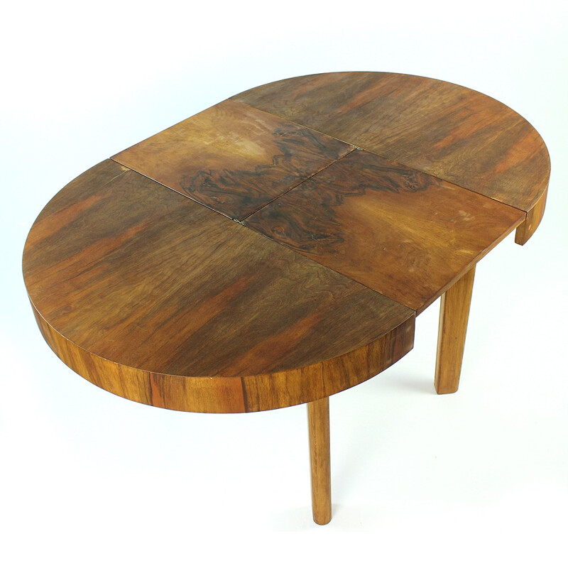 Round dining table in walnut by Jitona - 1960s