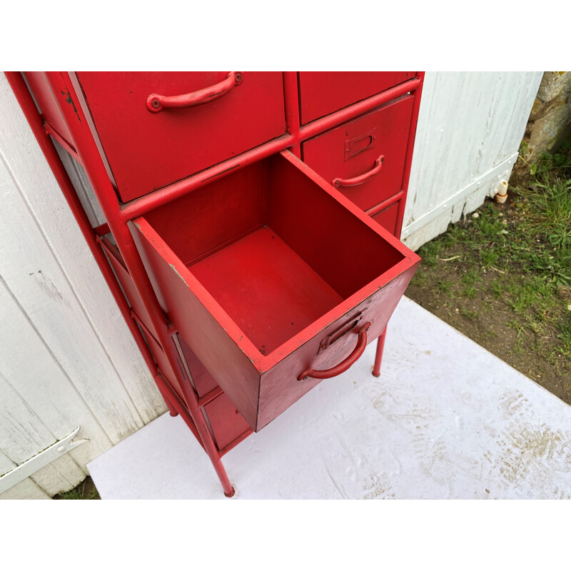 Vintage red industrial storage unit with 8 drawers