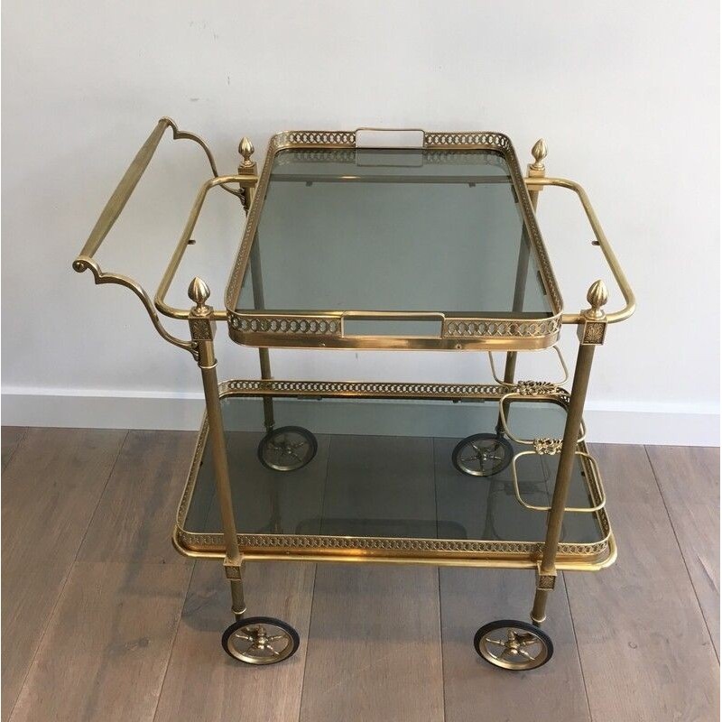 Vintage rolling table in brass and bluish glass for La Maison Jansen, France 1940