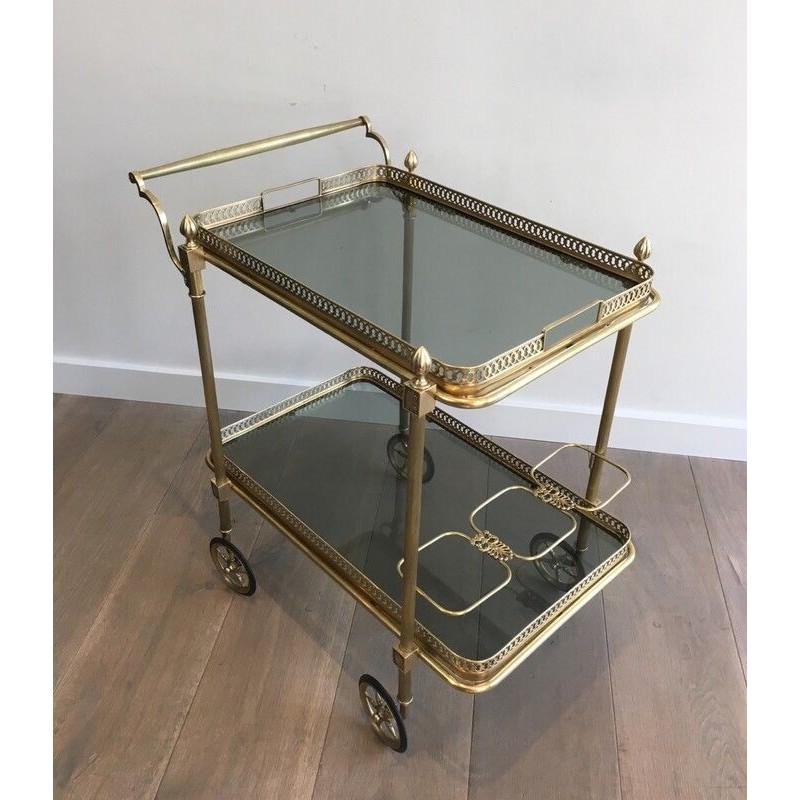 Vintage rolling table in brass and bluish glass for La Maison Jansen, France 1940