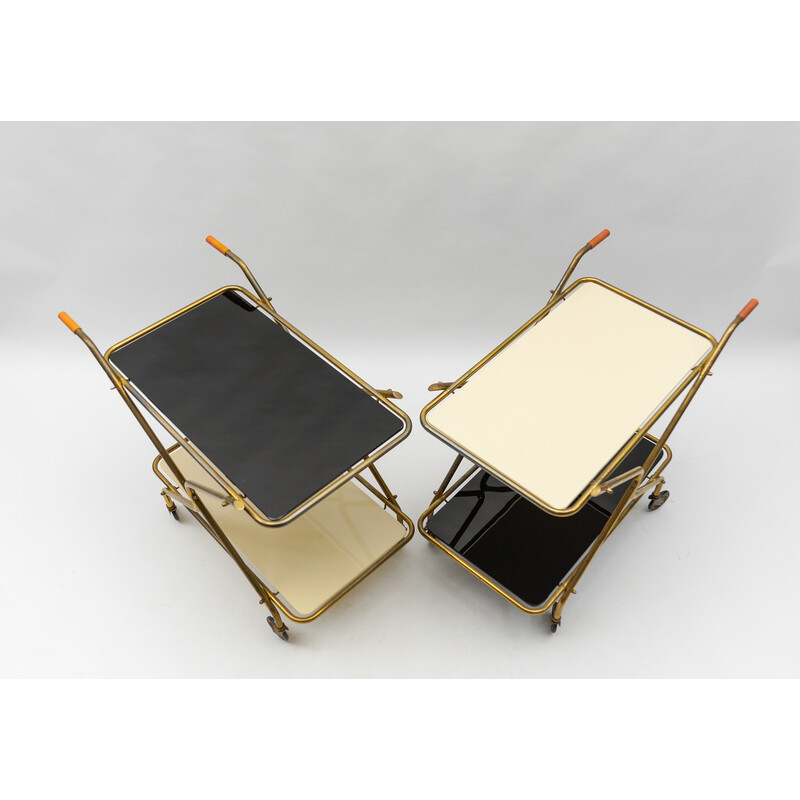 Pair of vintage brass and glass serving carts, 1950