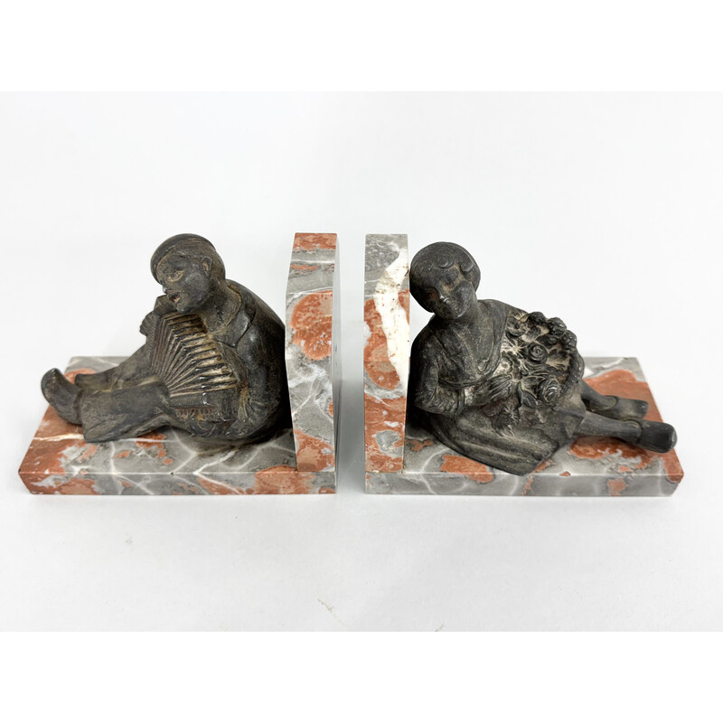 Coppia di reggilibri d'epoca in stile Art Déco con figurine di Léon Brunswick
