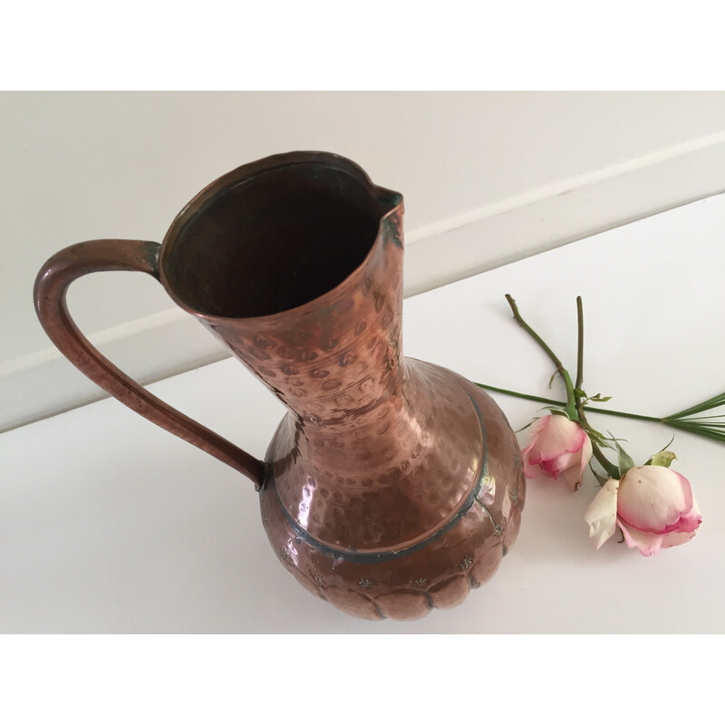 Vintage pitcher-shaped vase in hammered copper