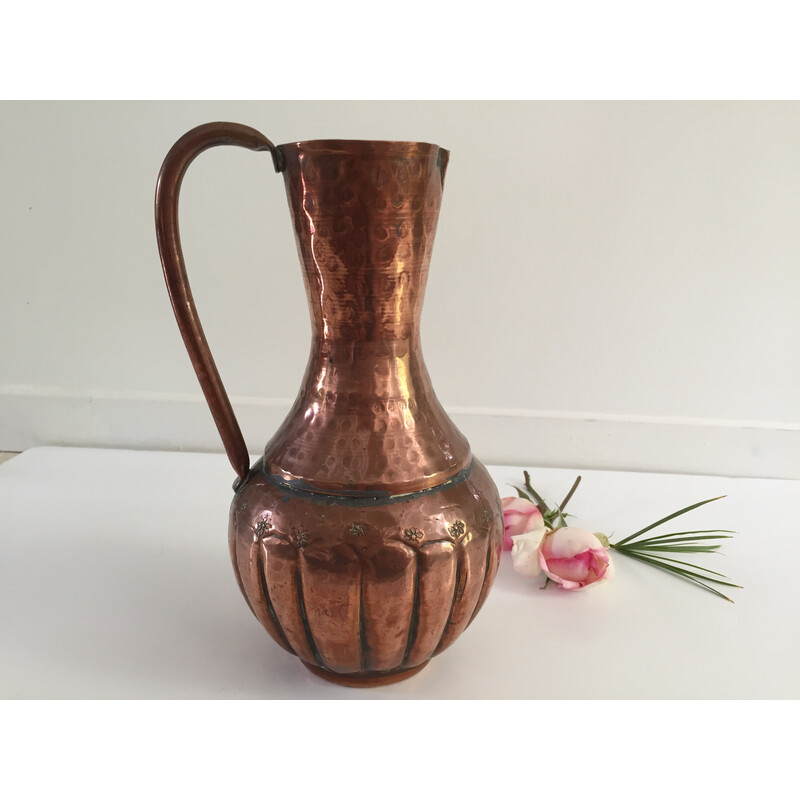 Vintage pitcher-shaped vase in hammered copper