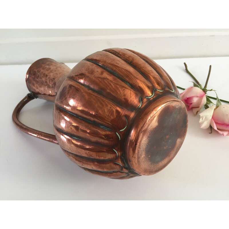 Vintage pitcher-shaped vase in hammered copper