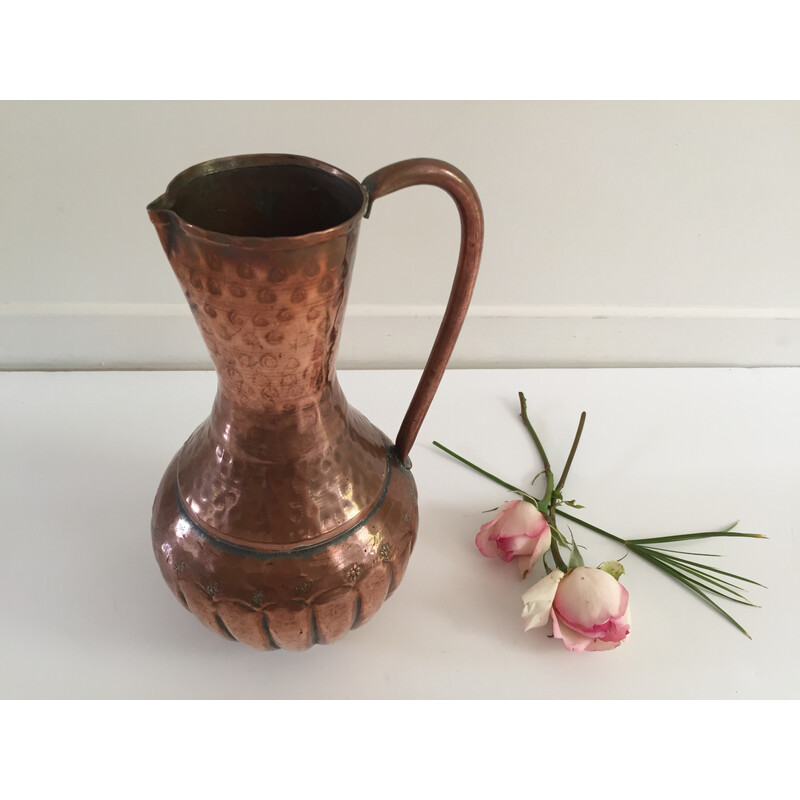 Vintage pitcher-shaped vase in hammered copper