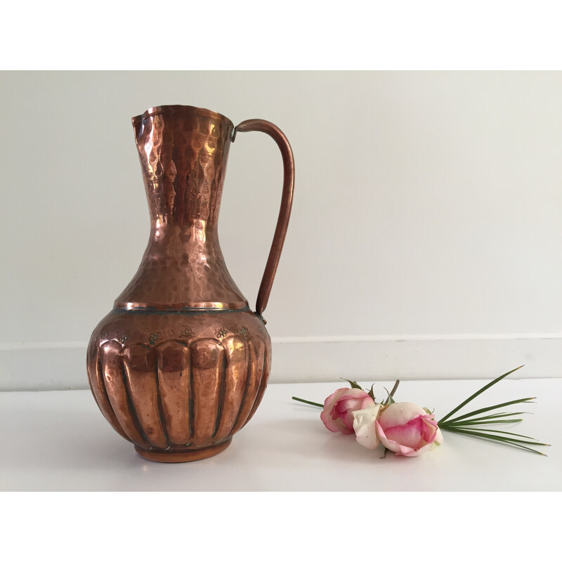 Vintage pitcher-shaped vase in hammered copper