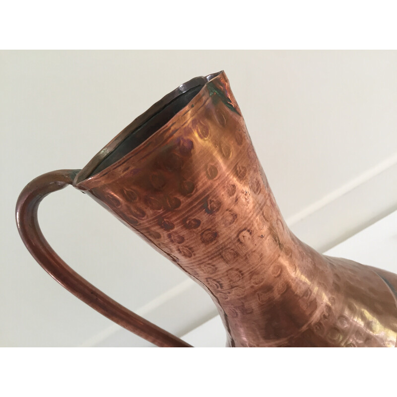 Vintage pitcher-shaped vase in hammered copper