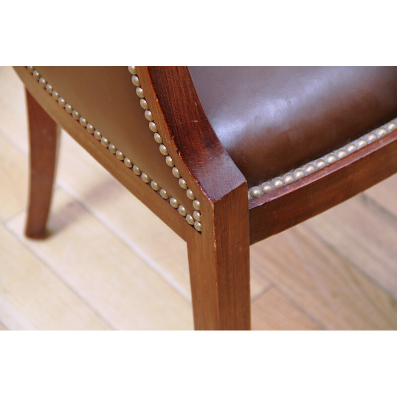 Pair of vintage barrel armchairs in varnished wood and brown leather