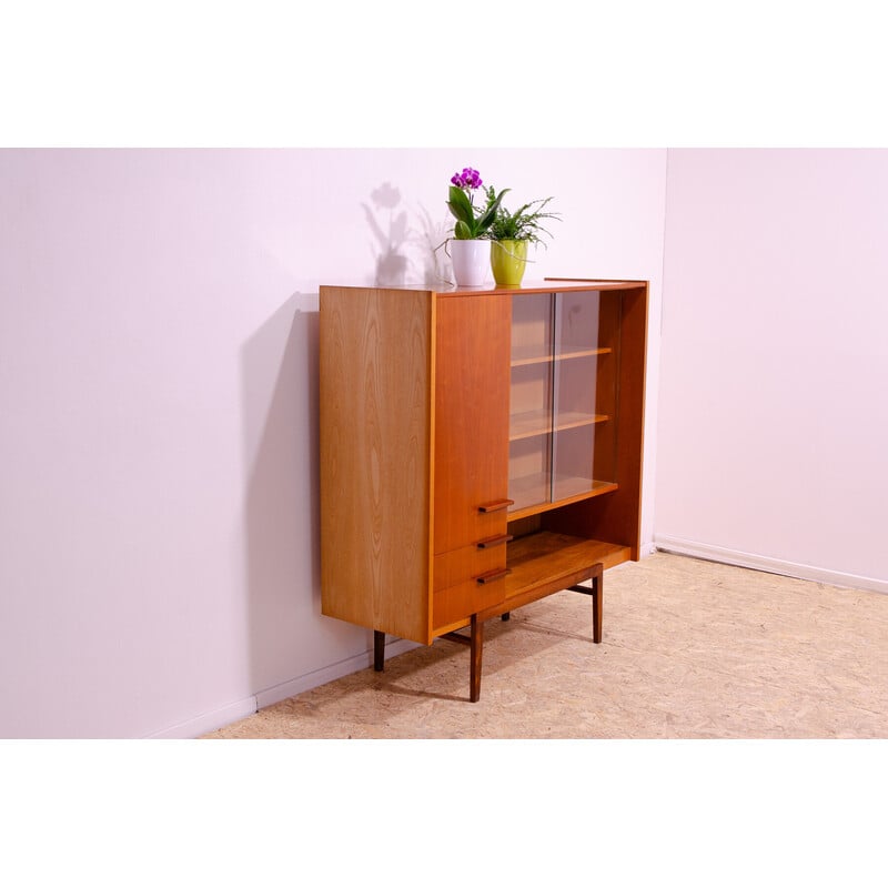 Vintage glazed bookcase in beech and ash wood by František Mezulánik for Up Závody, Czechoslovakia 1960