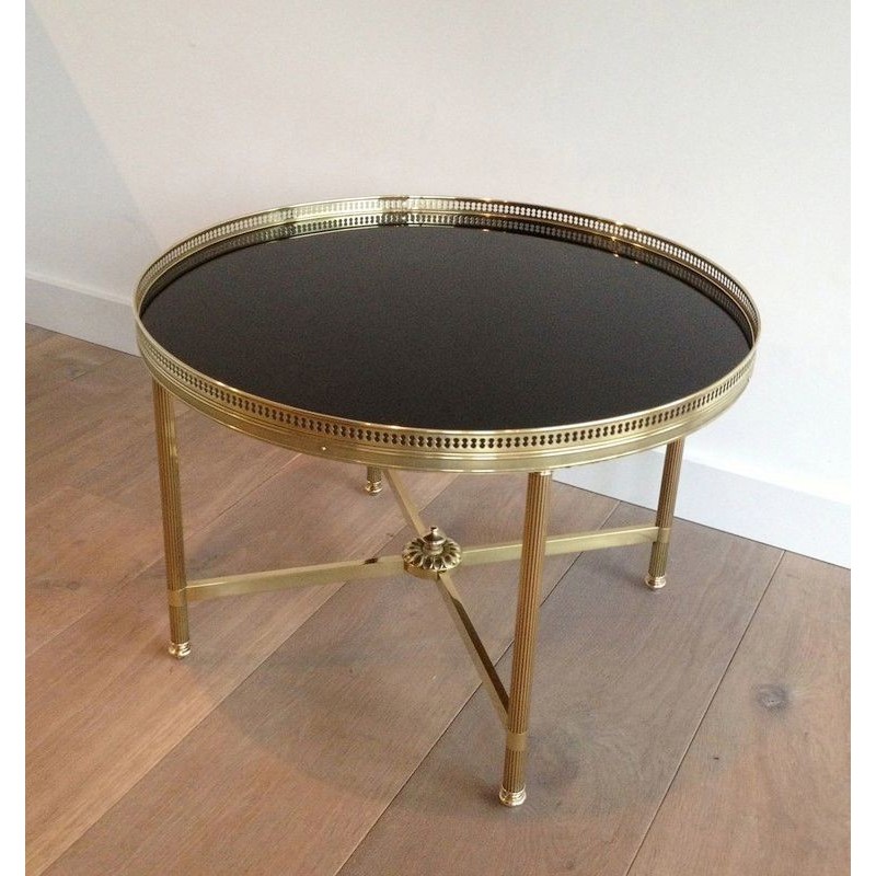 Vintage round coffee table in brass and black lacquered glass for La Maison Jansen, France 1940