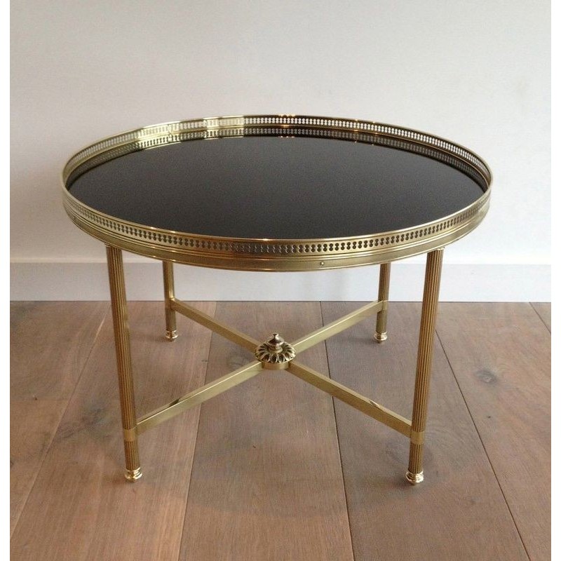 Vintage round coffee table in brass and black lacquered glass for La Maison Jansen, France 1940