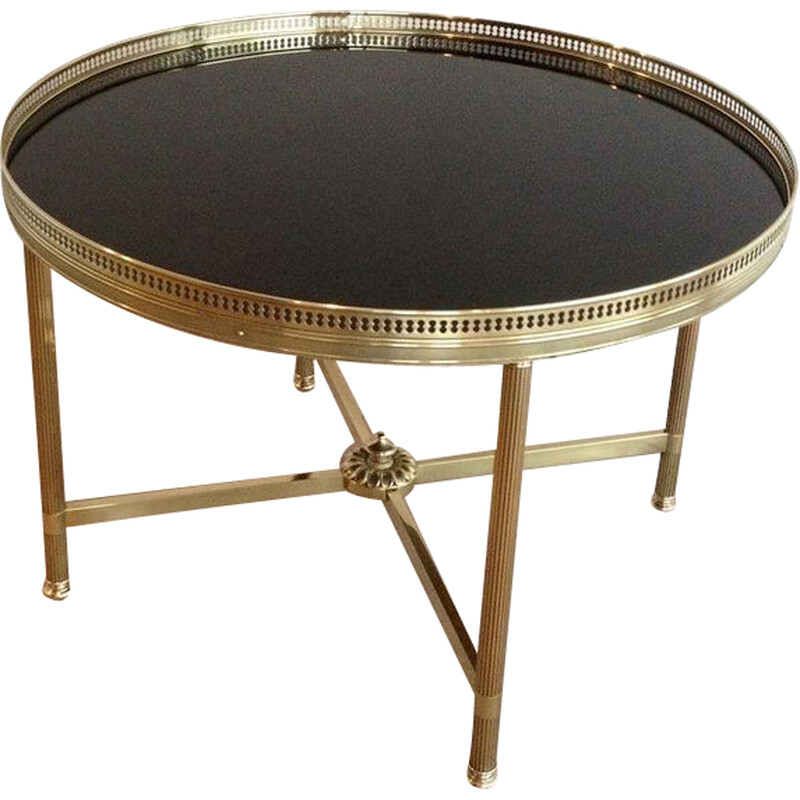 Vintage round coffee table in brass and black lacquered glass for La Maison Jansen, France 1940