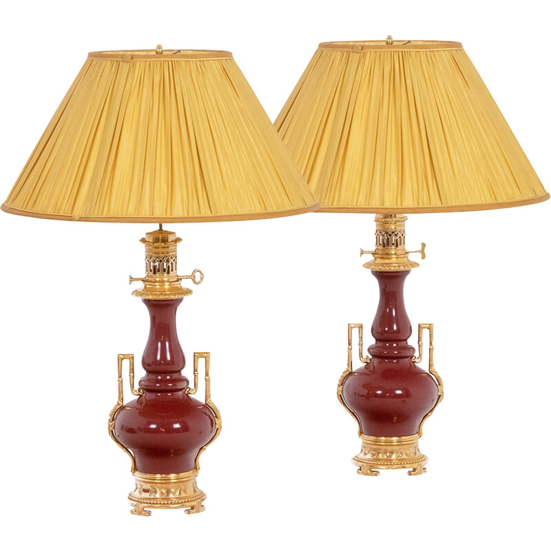 Pair of vintage lamps in bronze and oxblood red porcelain, 1880