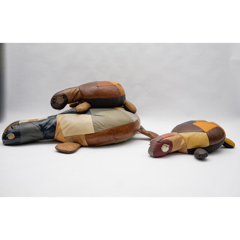 Set of 3 vintage Tortoise leather poufs, Switzerland 1960