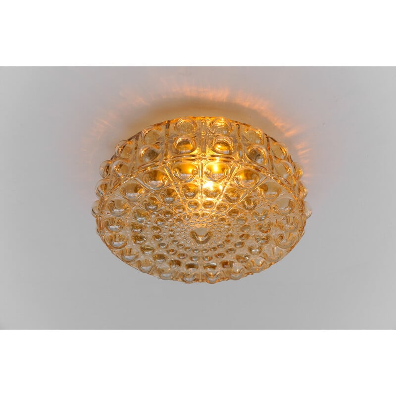 Vintage bubbled amber glass wall lamp by Helena Tynell, Germany 1960