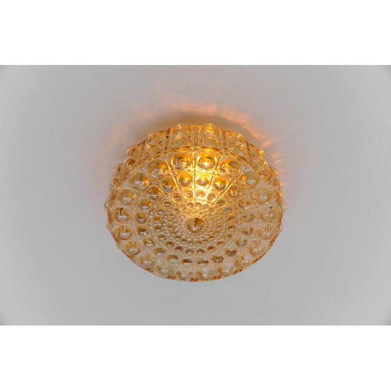 Vintage bubbled amber glass wall lamp by Helena Tynell, Germany 1960