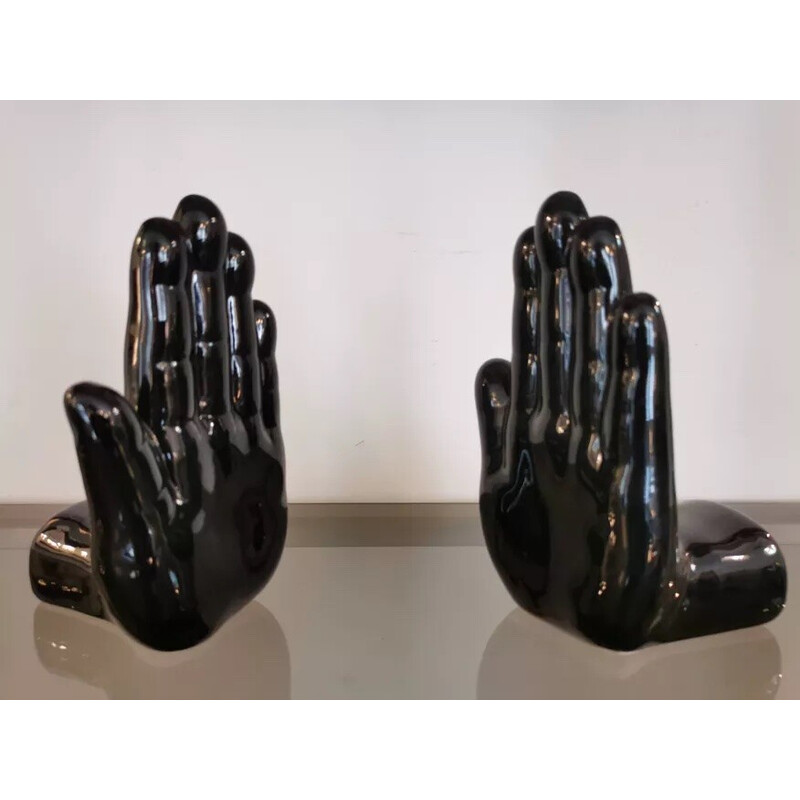 Pair of vintage hand-shaped black ceramic bookends