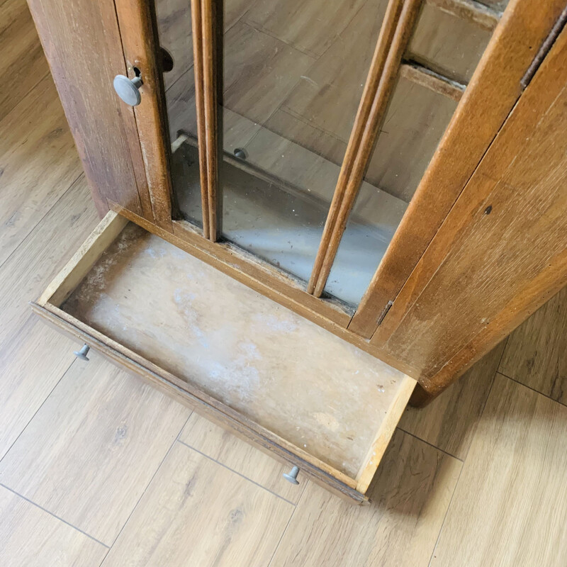 Vintage medicine cabinet in wood and glass