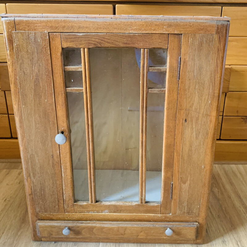 Vintage medicine cabinet in wood and glass