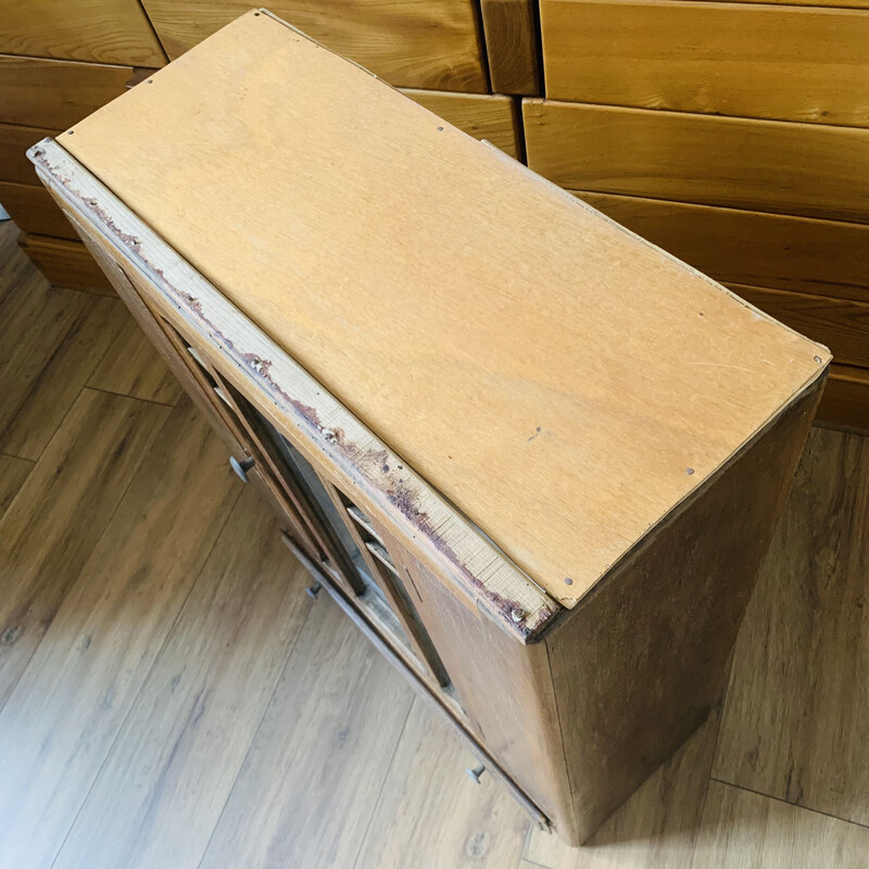 Vintage medicine cabinet in wood and glass