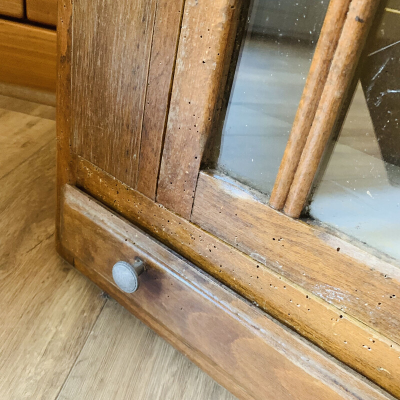 Vintage medicine cabinet in wood and glass