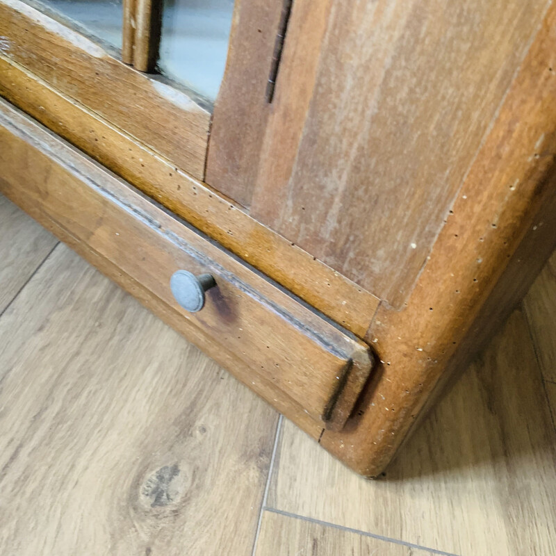 Vintage medicine cabinet in wood and glass