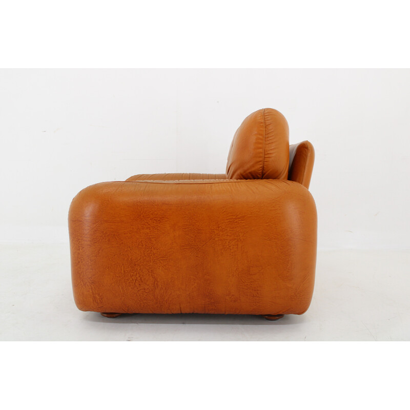 Vintage armchair in cognac leather, Italy 1970