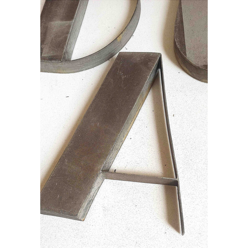 Vintage metal lettering composed of 14 letters, 1930