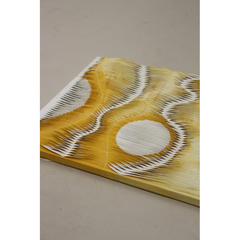 Vintage painting with wave and relief effect by pleating in shades of yellow