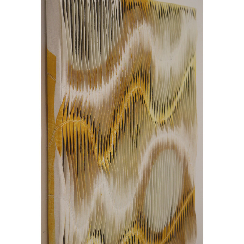 Vintage painting with wave and relief effect by pleating in shades of yellow