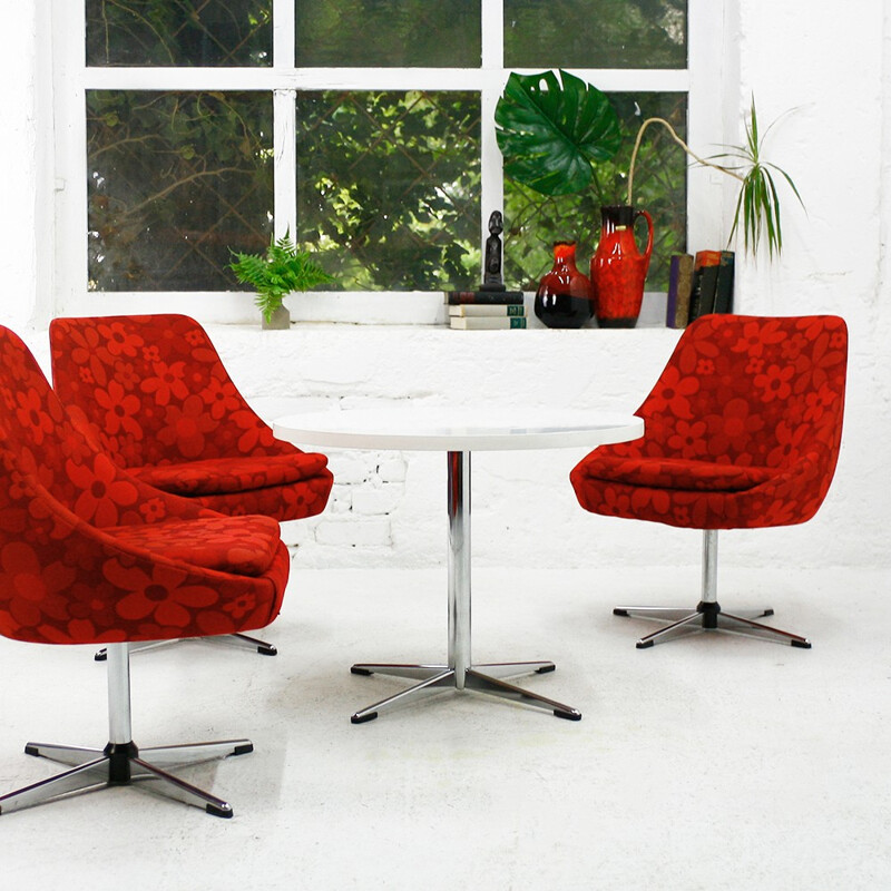 Swivel red chair with floral pattern - 1970s